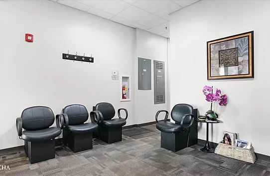 Shared client waiting area for salon suite tenants at Washington Place, Oswego IL