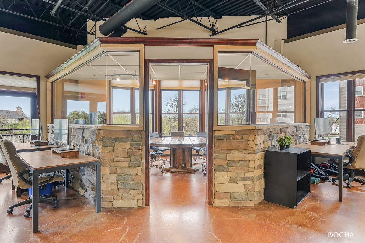Suite 322 glass-walled offices with stone masonry accents - 1,775 SF office suite at Washington Place, Oswego